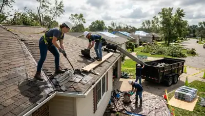 Storm damage restoration crew in Sterling Heights, MI repairing water damage in a home